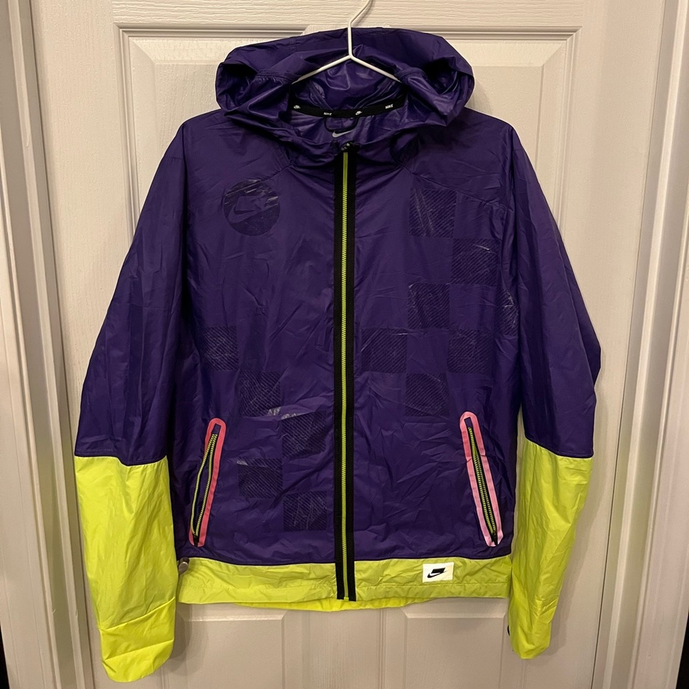 Nike Shield Checkerboard Running Jacket. Vinyls along back have slight wear.